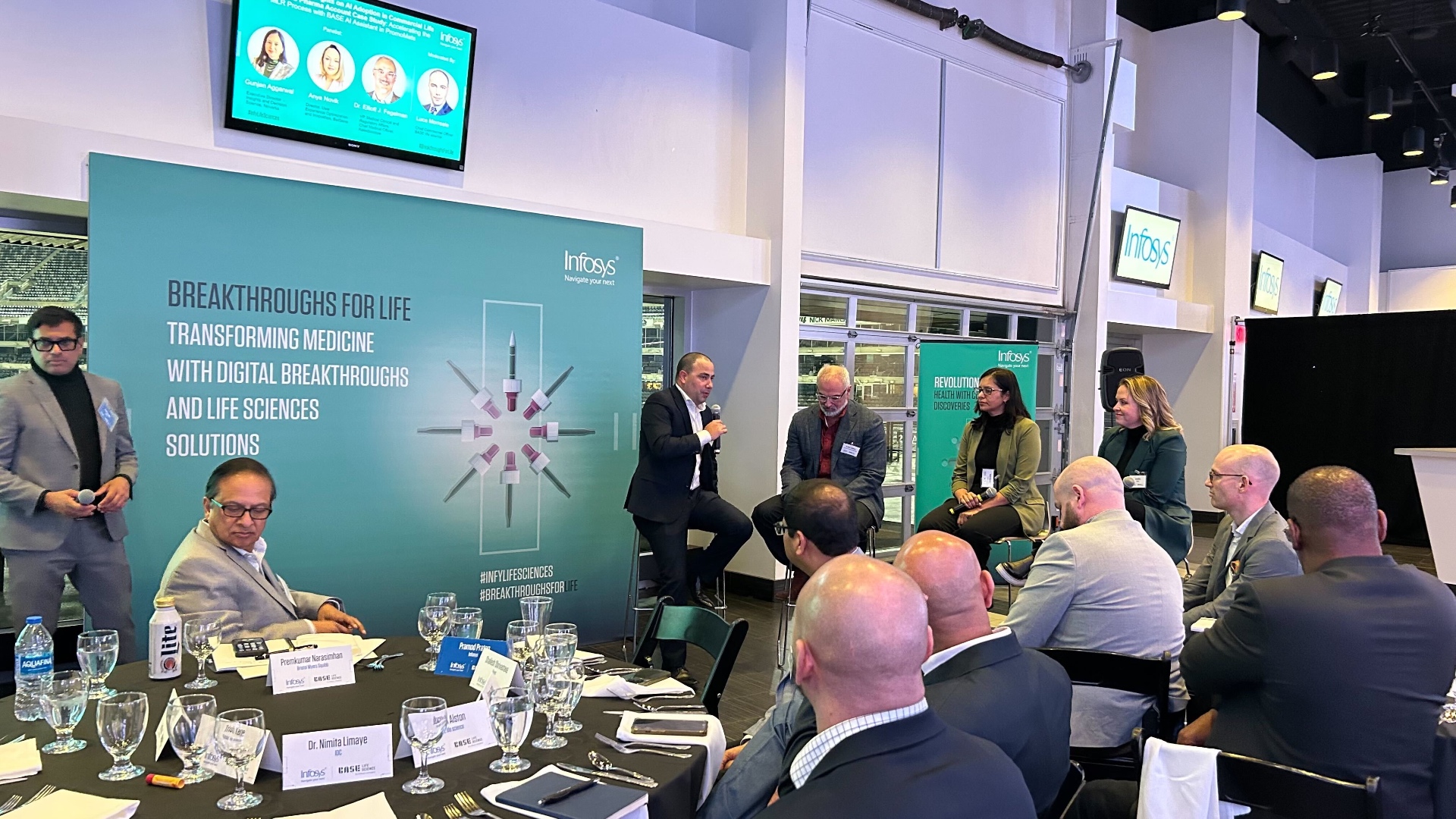 Executive panel discussion at professional event